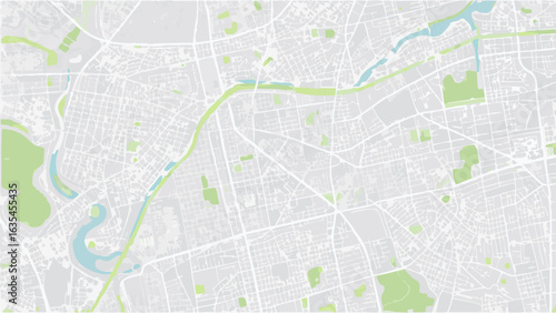 Vector aerial view of a city map with parks and rivers in a muted color palette showing urban planning details