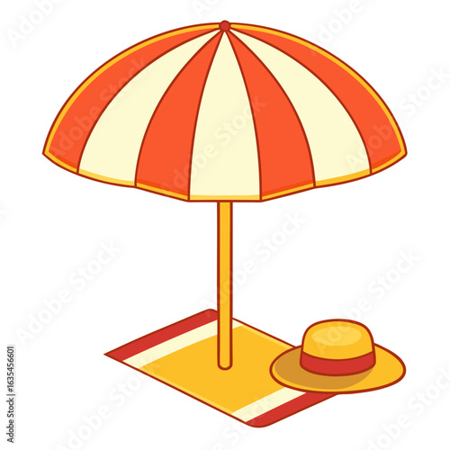 Beach umbrella and hat on a towel