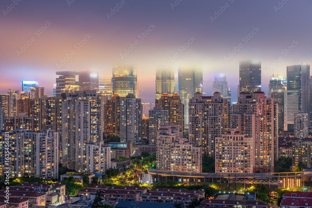 Naklejka premium Shanghai Lujiazui Three-Piece in the mist at night