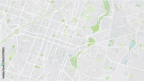 Vector aerial view of city map with grid like streets and green spaces in a light color palette style design