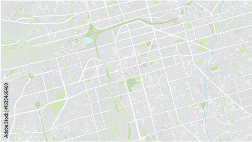 Vector aerial view of a city map featuring a grid layout of streets and green spaces in a light color palette