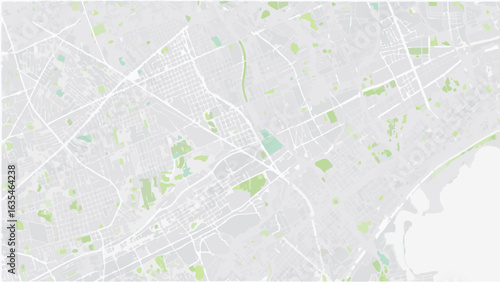 Vector aerial view of a city with a network of roads and scattered green spaces creating a detailed urban landscape