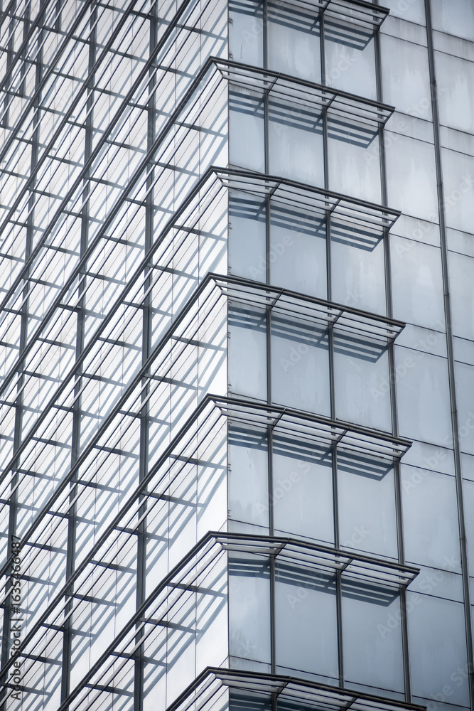 Fototapeta premium Highrise modern glass building with structural pattern in India