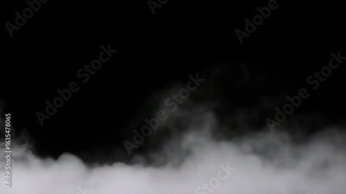Fog and smoke effect on black background for video editing. Slow horizontal scrolling. Infinite repeat loop