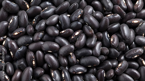 Close-up top view of black beans forming a perfect circle, captured using mirrorless camera, 50mm lens, focus on texture contrast and shadow layering