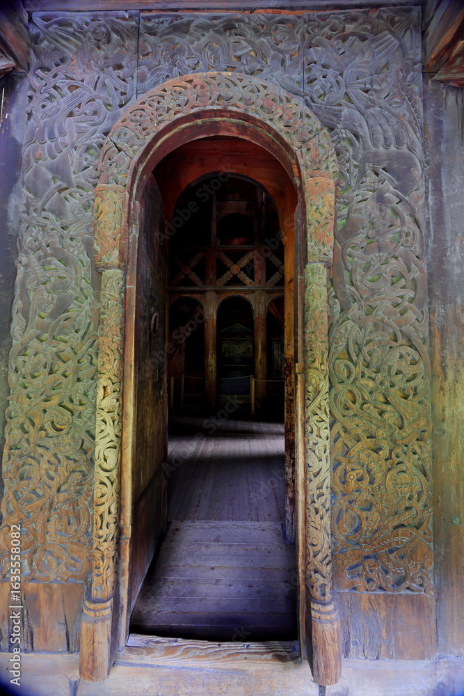 Fototapeta premium Borgund Stave Church and annex buildings, built around 1180 and located in Borgund, Norway.