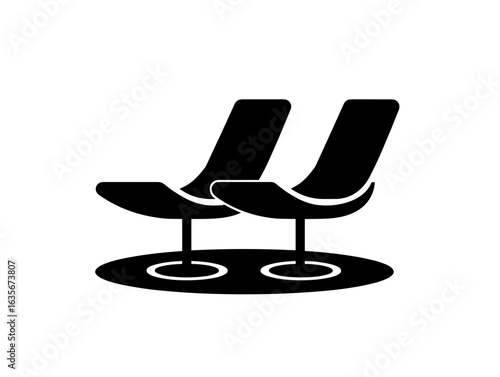 Two modern lounge chairs in minimalist design on circular rug  
