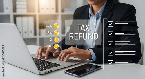 Tax refund processing with a business professional using a laptop in an office environment