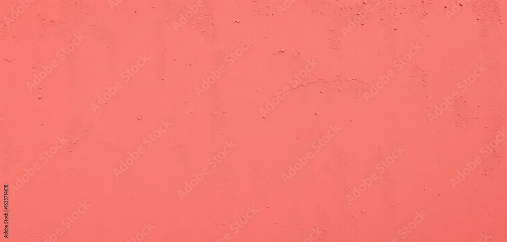 Obraz premium Warm coral stucco wall with textured surface, irregular patterns and subtle shadows, tone, coral