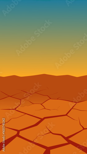 Cracked dry earth landscape under a gradient sky at sunset