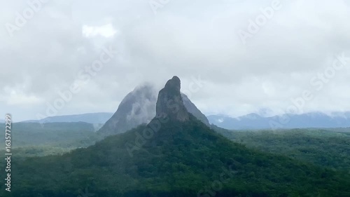 Mount Coonowrin in Mist, Glass House Mountains Queensland Australia. Mountain landscape with clouds
