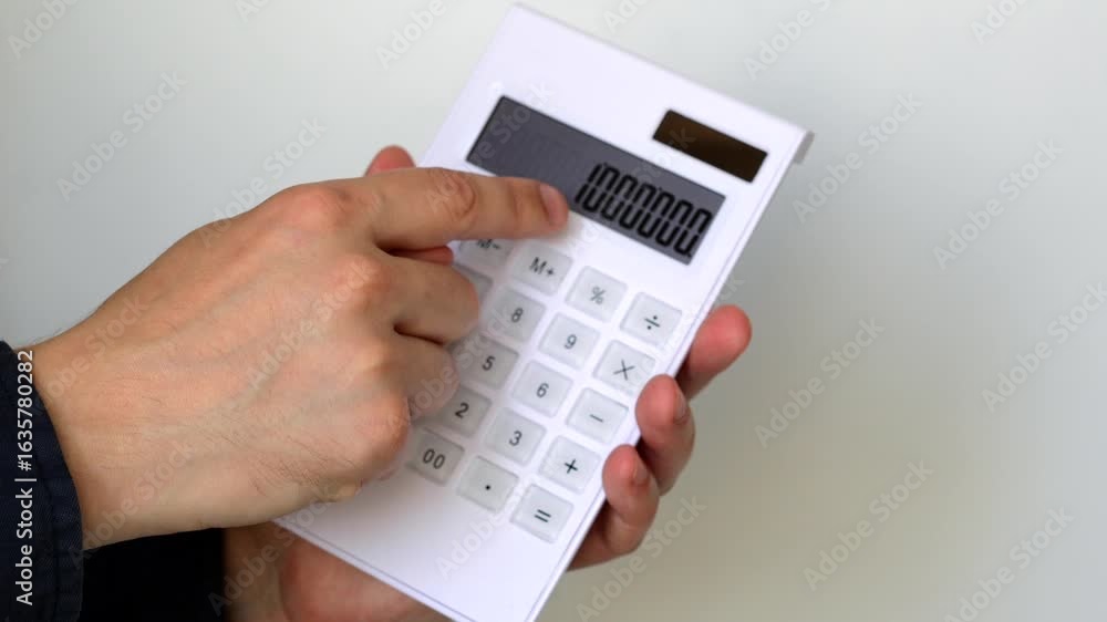 Business and finance concept.
A financier in an office calculates profits on a calculator.Using a calculator for calculations.
A financial worker or banker.
Accounting and office work Business and finance concept.
A financier in an office calculates profits on a calculator.Using a calculator for calculations.
A financial worker or banker.
Accounting and office work