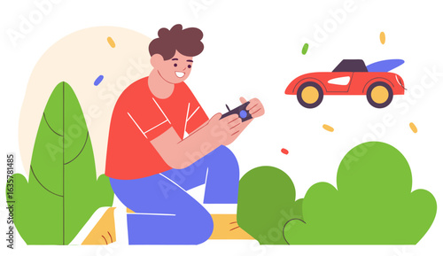 Boy kneeling on the floor, smiling and playing with a remote control car. The car is in motion with playful movement lines