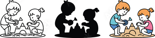 Happy children building sandcastles at the beach playing together