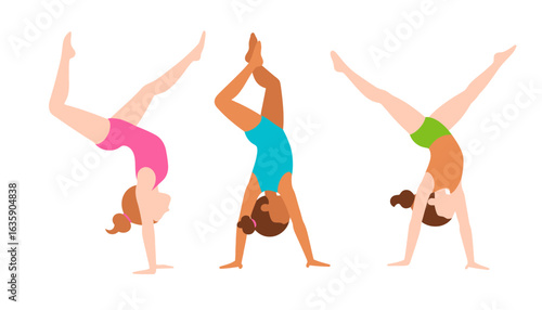 A diverse group of young female gymnasts performing handstands together