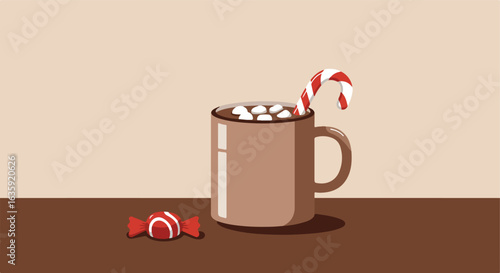 A mug with a candy cane, hot beverage, and a wrapped candy sits on the table