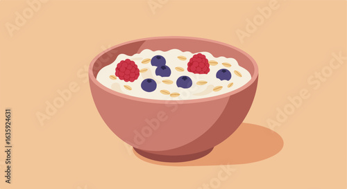 Oatmeal delight Pink bowl filled with oatmeal, blueberries, & raspberries on beige background
