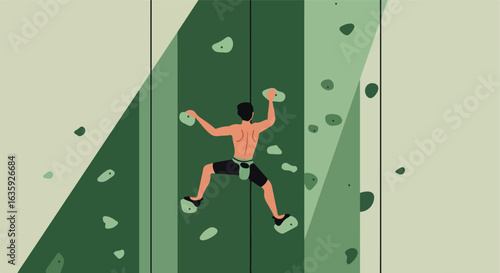 Man climbs a rock wall with green & light-green blocks in an indoor setting