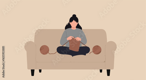 Knitting A woman knits comfortably on a couch with yarn balls around her