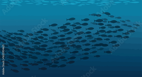 School of fish silhouettes swimming in blue ocean with surface water reflections