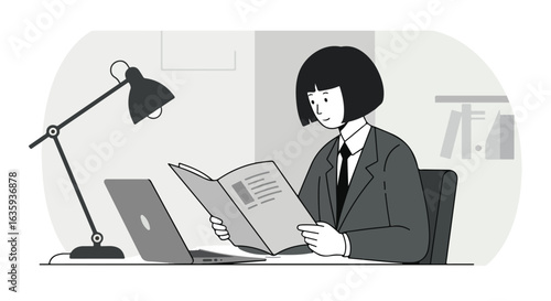 Professional reads a document in the office under a lamp next to a laptop