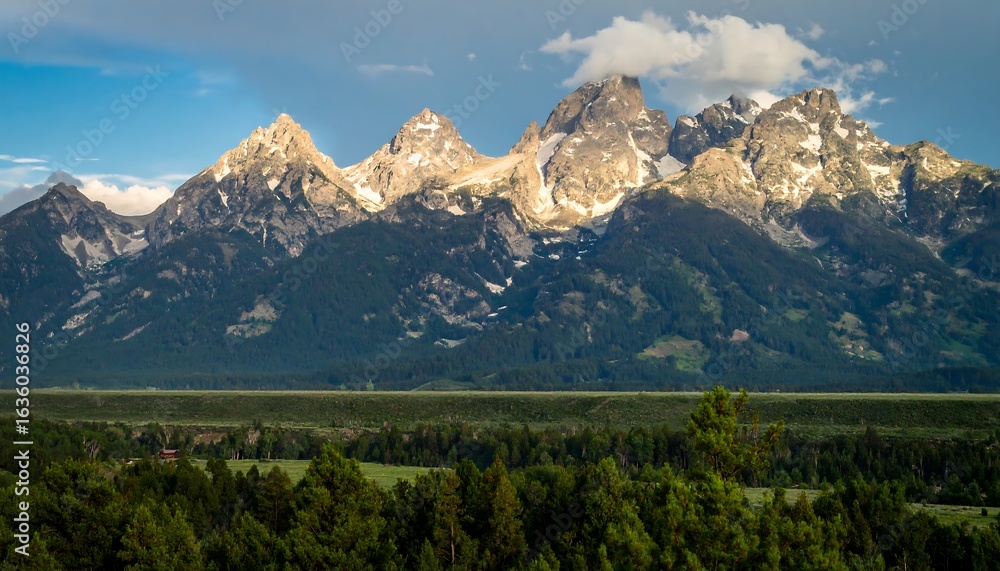Fototapeta premium Majestic mountain range overlooking a valley