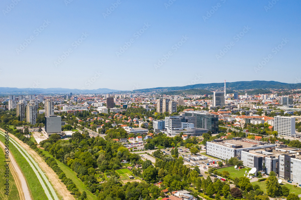 Obraz premium Panoramic view on Sava river and modern national television building in Trnje, Zagreb, Croatia