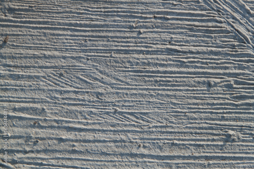 Fototapeta premium Texture of textured plaster. Coarse plaster. Texture gray textured
