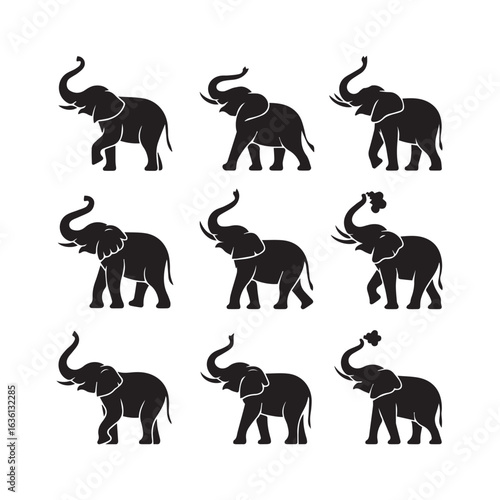 Collection of silhouetted elephants in various poses showing their majestic forms