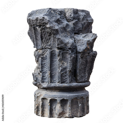 Isolated stone column fragment against black backdrop showcasing architecture and historical detail
