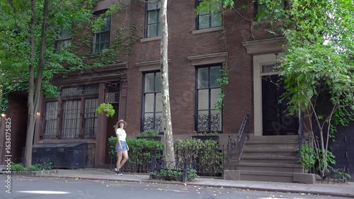 Wallpaper Mural A charming brownstone nestled amid lush greenery evokes a sense of urban tranquility and encourages exploration Torontodigital.ca