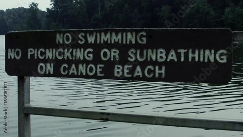 No swimming sign on the lake