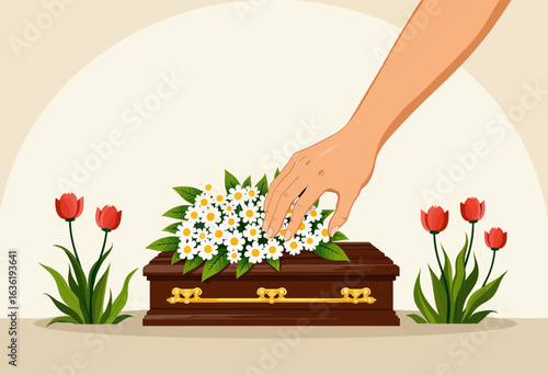 Hand placing flowers on a brown coffin surrounded by tulips  