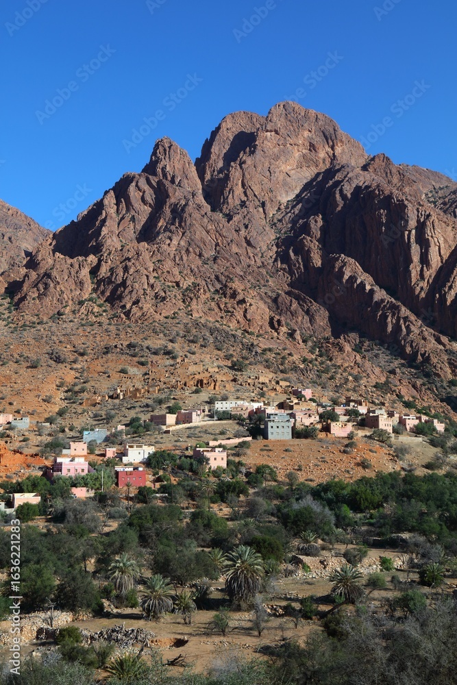Naklejka premium Anti-Atlas mountains landscape and small village near Tafraout, Morocco. Sunrise light.