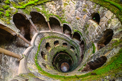 Spiral Initiation Well of Quinta da Regaleira in Sintra, Portugal with Mystical Atmosphere