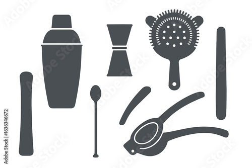 Essential cocktail making tools arranged creatively for a vibrant bar setup