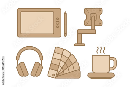 Creative workspace setup with digital tablet, headphones, color palette, and coffee cup during daytime