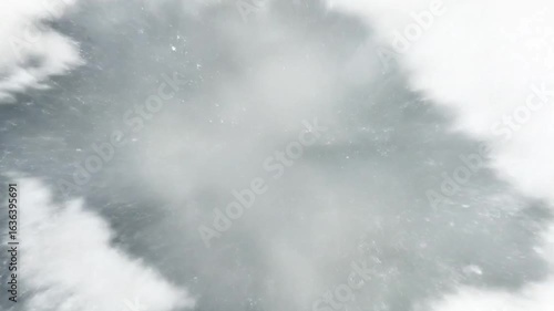 Earth zoom-in animation from deep outer space. Starts with a view of the entire Earth in the blackness of space, with stars in the background. Camera rapidly zooms toward the Earth, passing