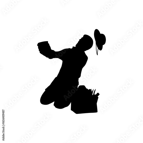 A dramatic silhouette of a person kneeling and seemingly overwhelmed by a crate of beverages.