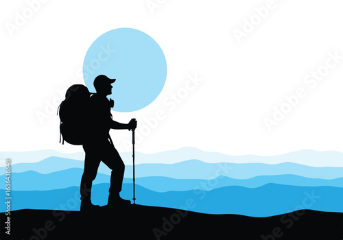Silhouette of a hiker with a backpack and trekking pole standing on a mountain peak against a blue sky with a large sun