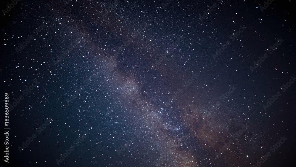 Vast expanse of the night sky, showcasing the Milky Way galaxy with countless stars. Vast expanse of the night sky, showcasing the Milky Way galaxy with countless stars.