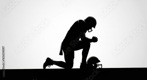 Silhouette of a Kneeling American Football Player with Hands Clasped in Reverence