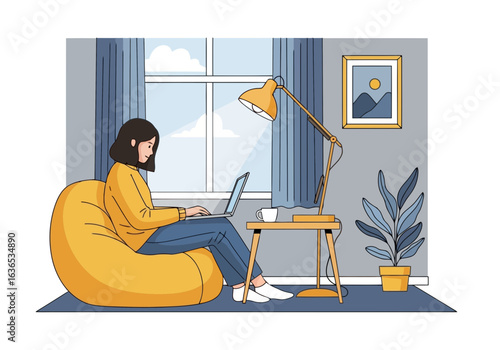 Young woman working on a laptop while sitting on a comfortable beanbag chair in a cozy home office with a lamp and a plant
