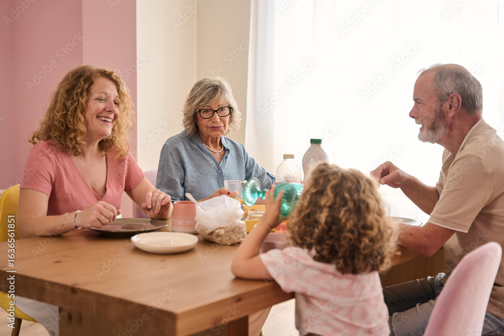 Fototapeta premium Family enjoying breakfast together at home