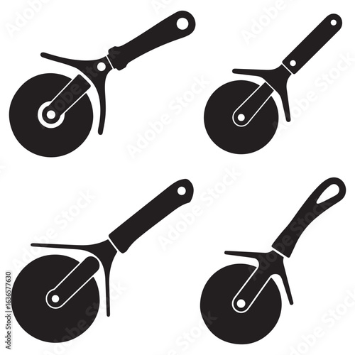Four Black Pizza Wheel Cutters Isolated on White