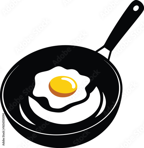 Black silhouette of a fried egg in a pan