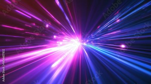 Abstract image of vibrant pink and blue light streaks converging towards a bright central point, creating a dynamic and energetic composition.