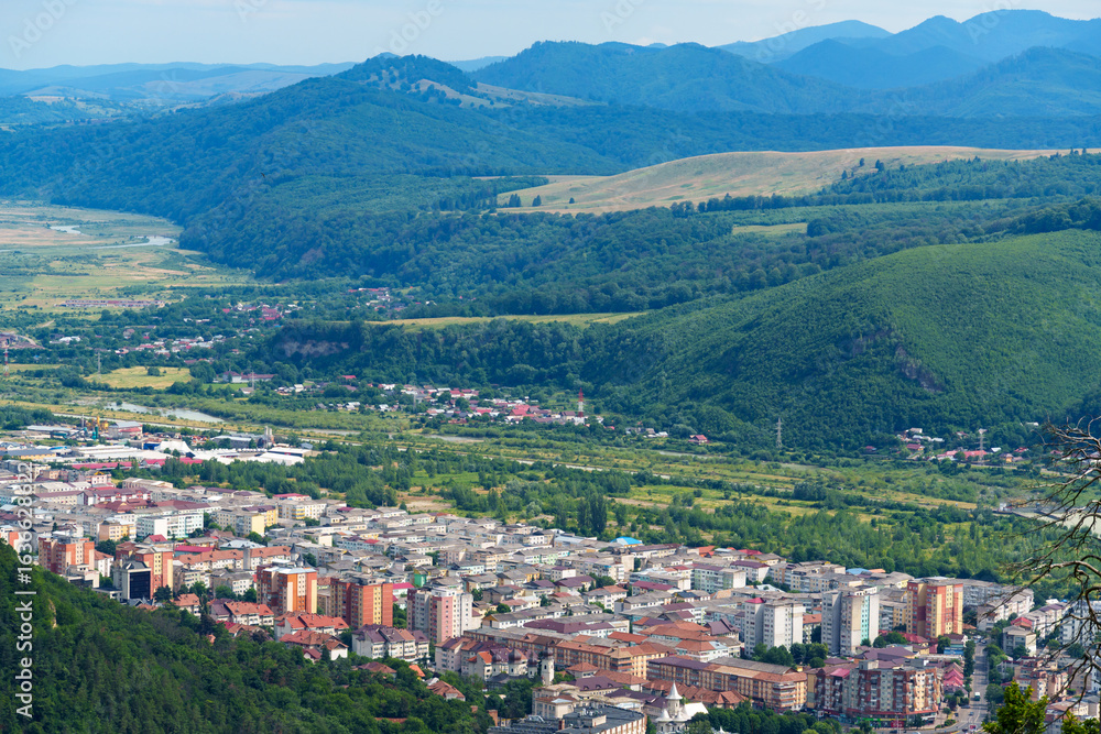 Fototapeta premium panoramic view from above on the street of city Piatra Neamt, Romania, city architecture, urban landscape