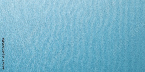 Blue gradient distortion with vertical ripple texture, frosted glass effect and icy reeded lines. Minimal blur surface with cool tones and subtle wave pattern.