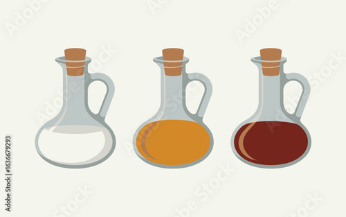 Three glass bottles with corks containing clear amber and red liquids